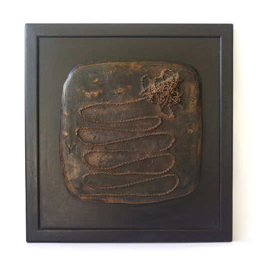 "Chain", bronze plaque on wood