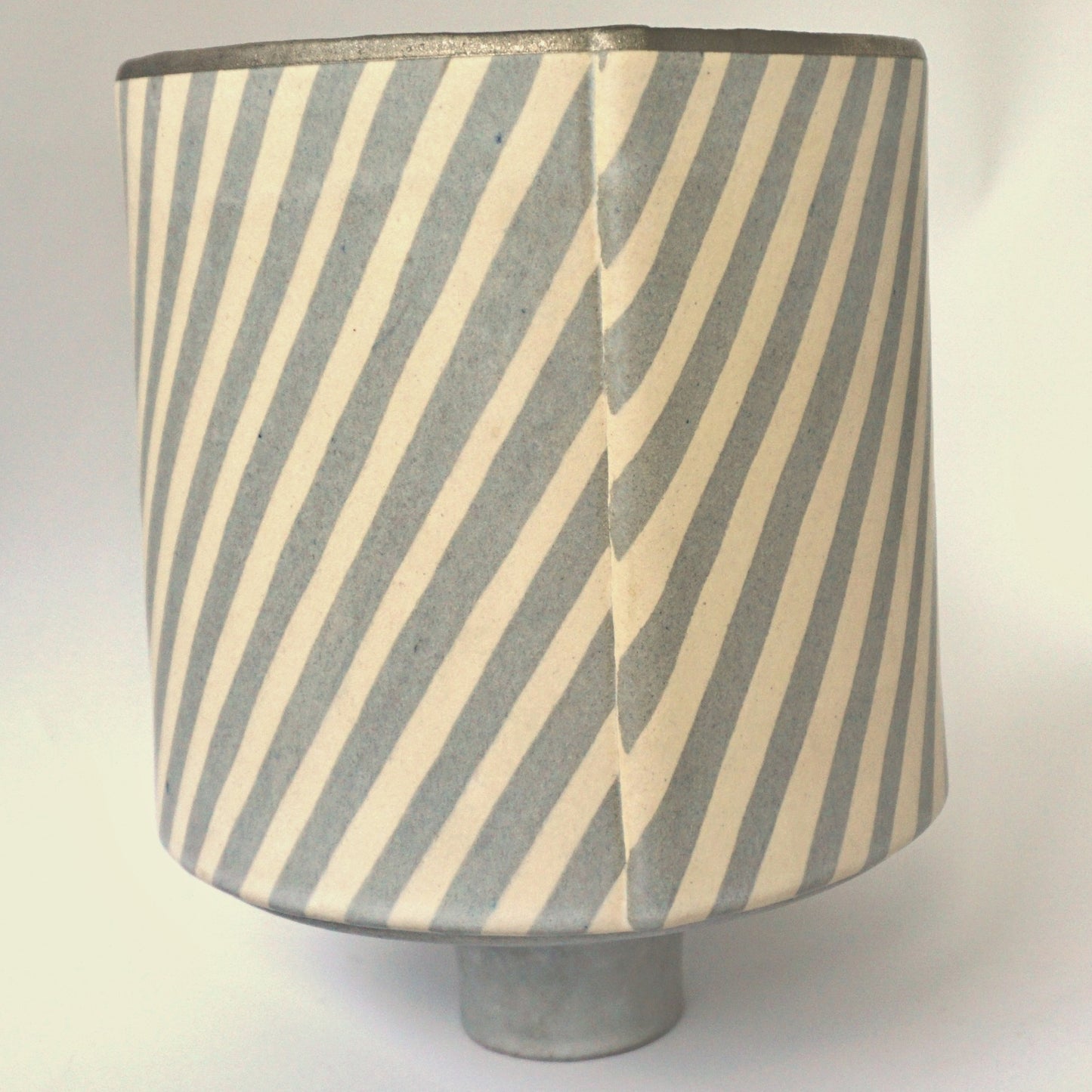 striped cylindric pot